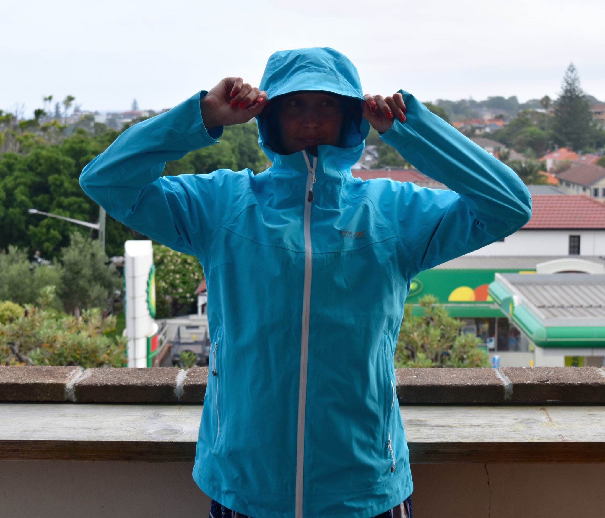 Hayley in a blue rain jacket 