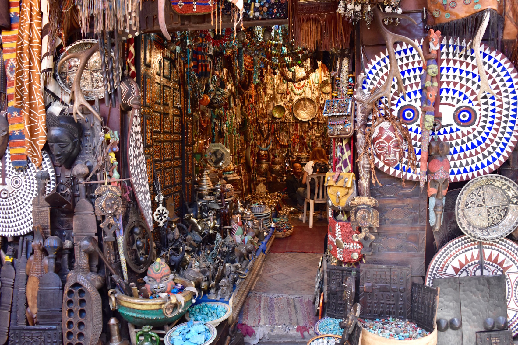 A shop selling colourful Moroccan plates, trinkets and art. 