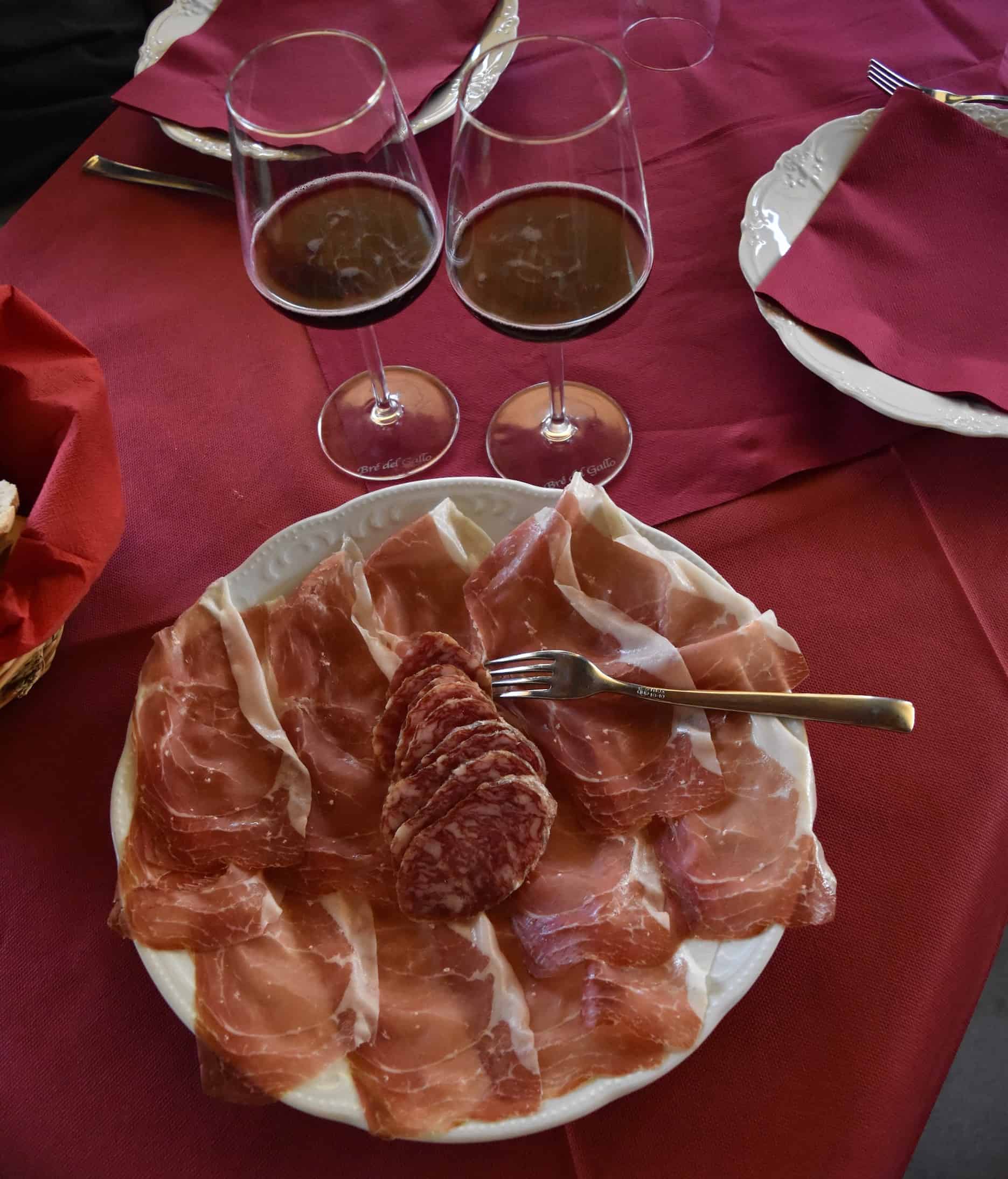 A plate filled with Culatello - italian cured pork from Emilia Romagna