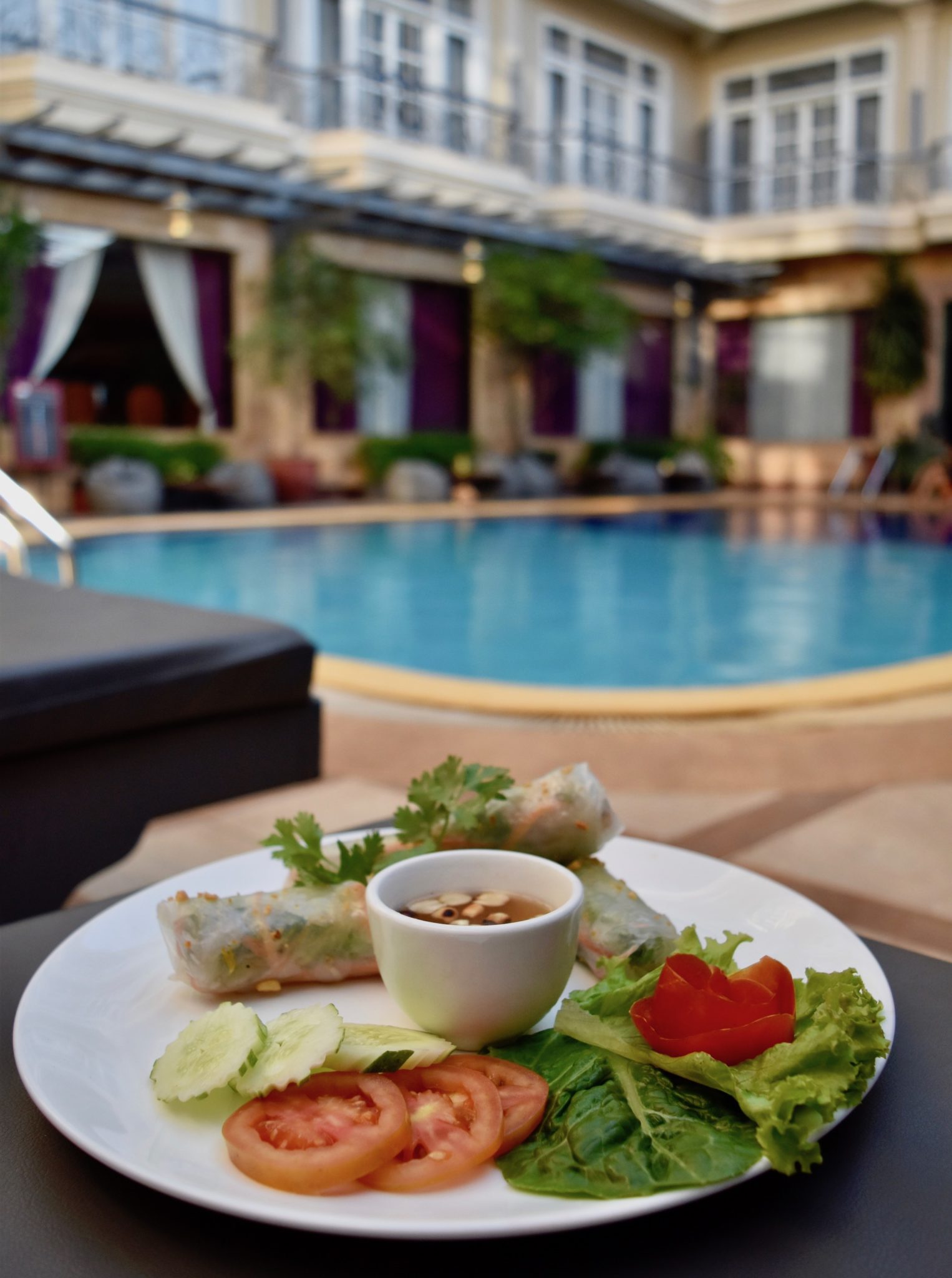 Summer rolls and salad by the pool 