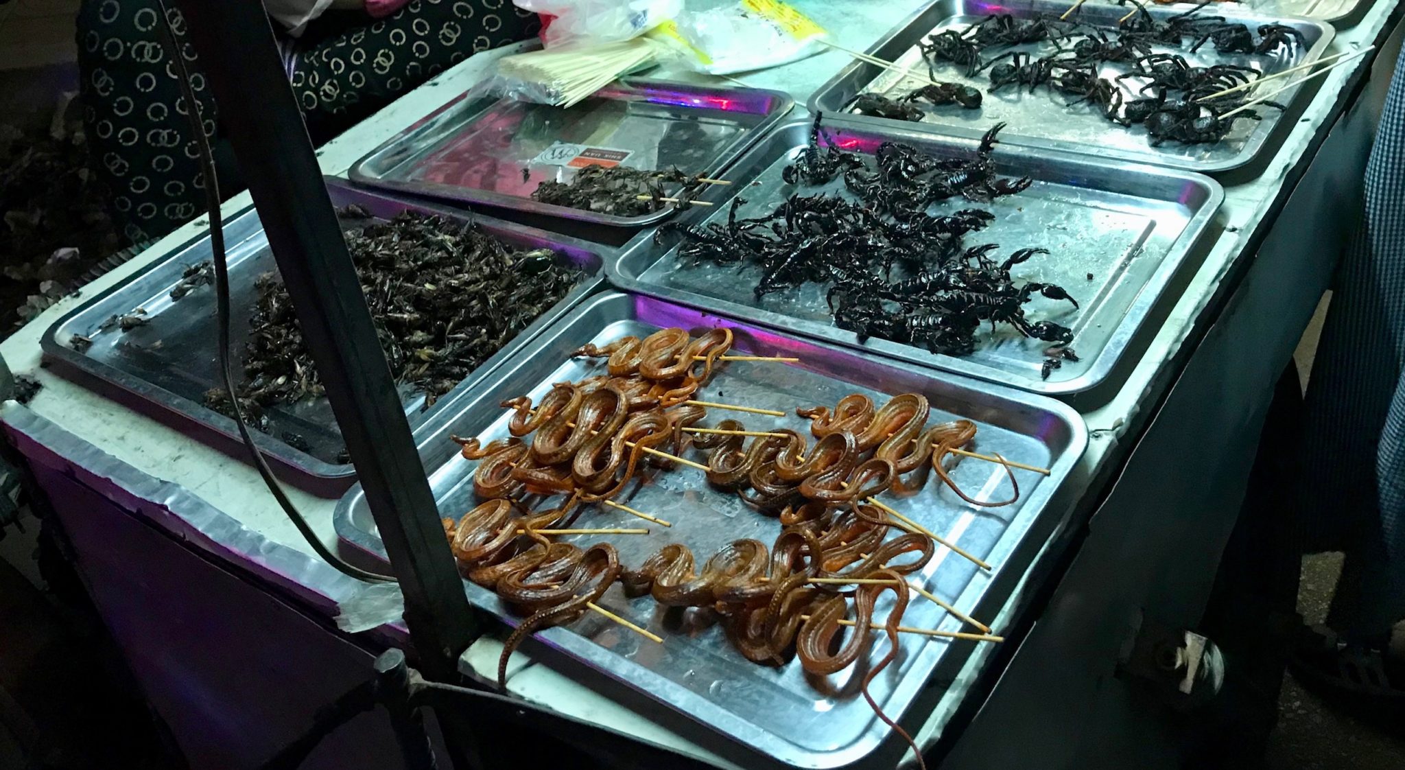Fried snakes and tarantulas at a market