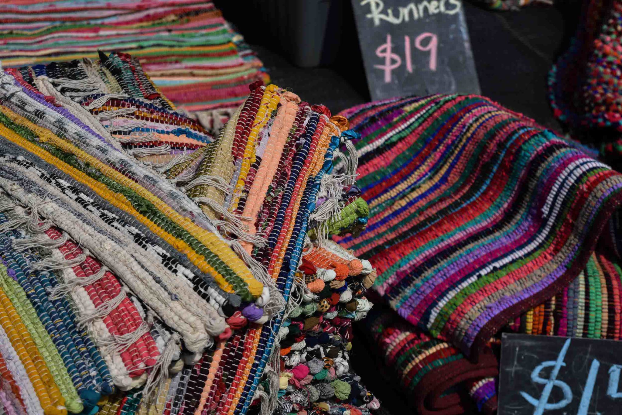 colourful mats for sale at the market 